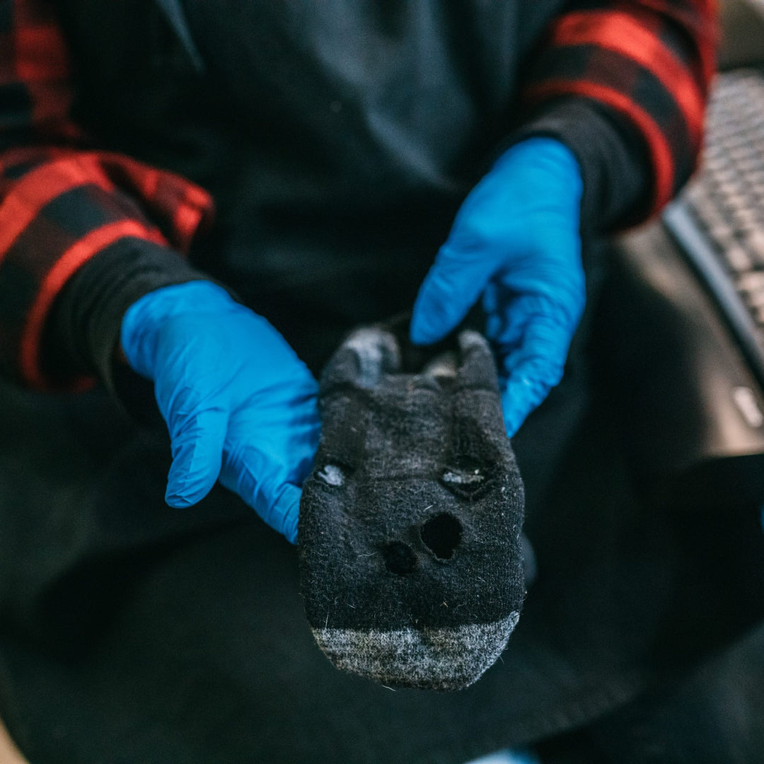 A sock with a hole that we covered under the darn tough lifetime warranty