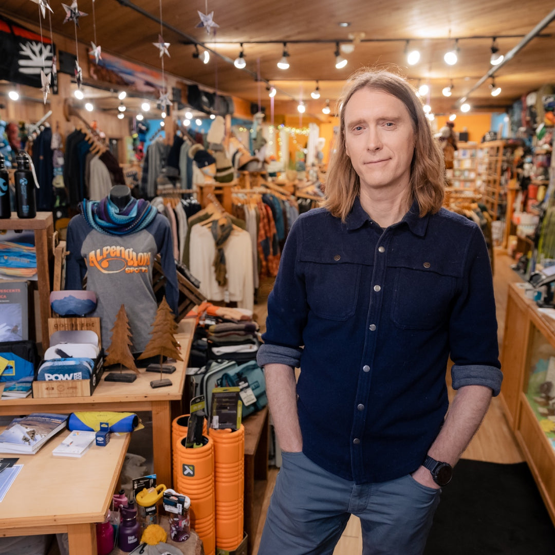 Owner Brendan Madigan standing on the floor in Alpenglow Sports Retail shop