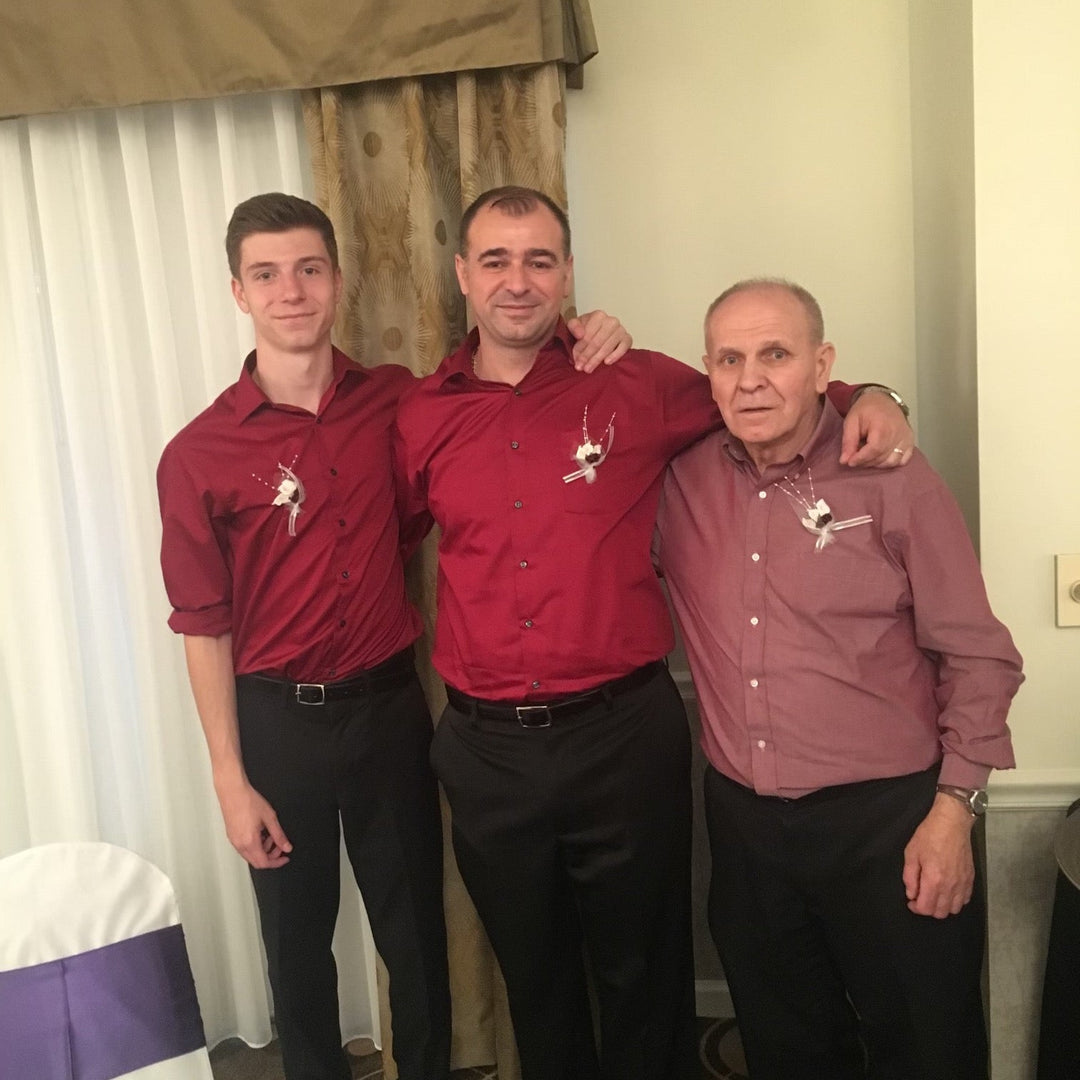 Denis, Adnan, and Abdija standing together, three generations of family and Darn Tough