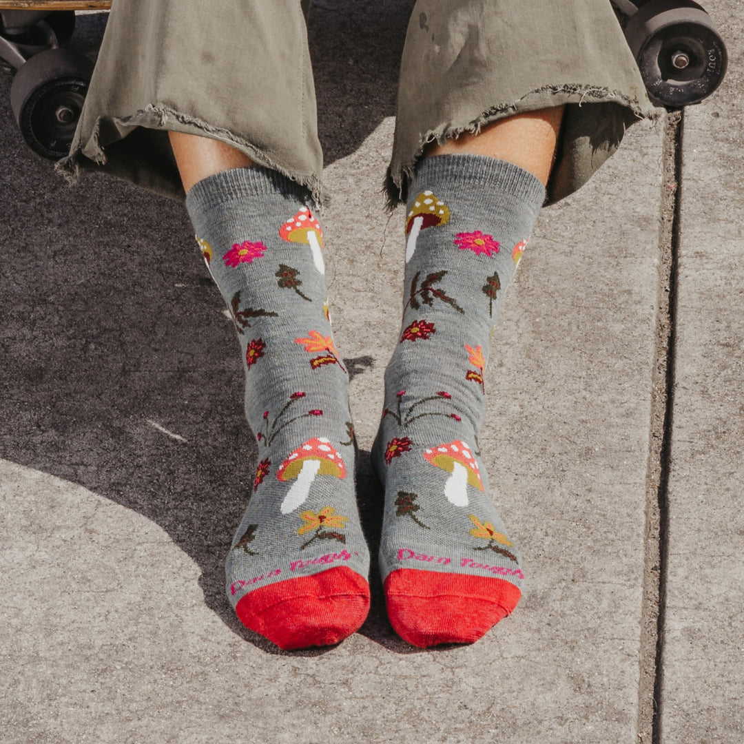 close up of models feet on sidewalk wearing the 6133 shroom bloom lightweight lifestyle crew in seafoam colorway