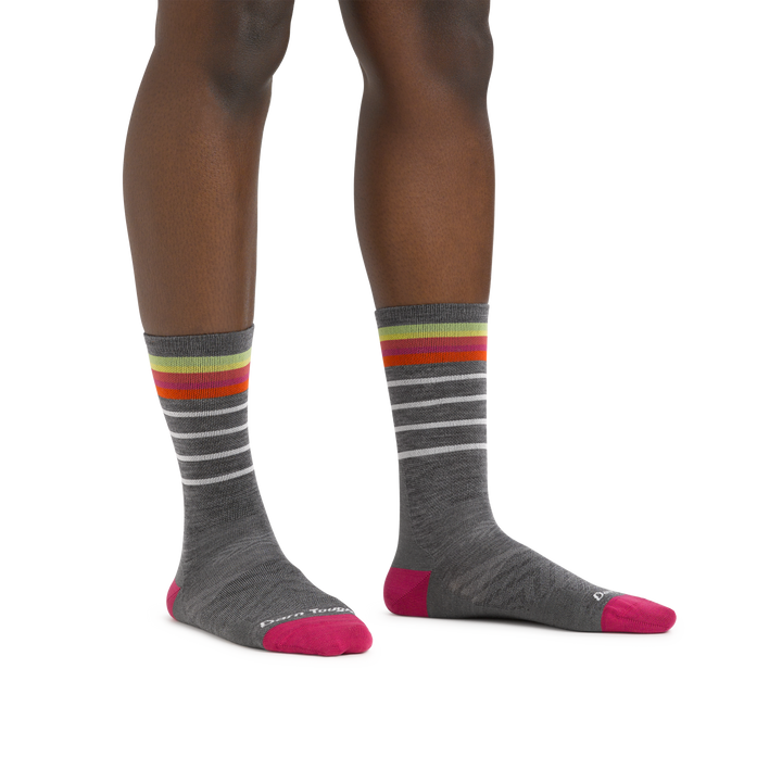 Image of a woman's legs on a white background wearing Women's Stride Micro Crew Ultra-Lightweight Running Sock in Gray