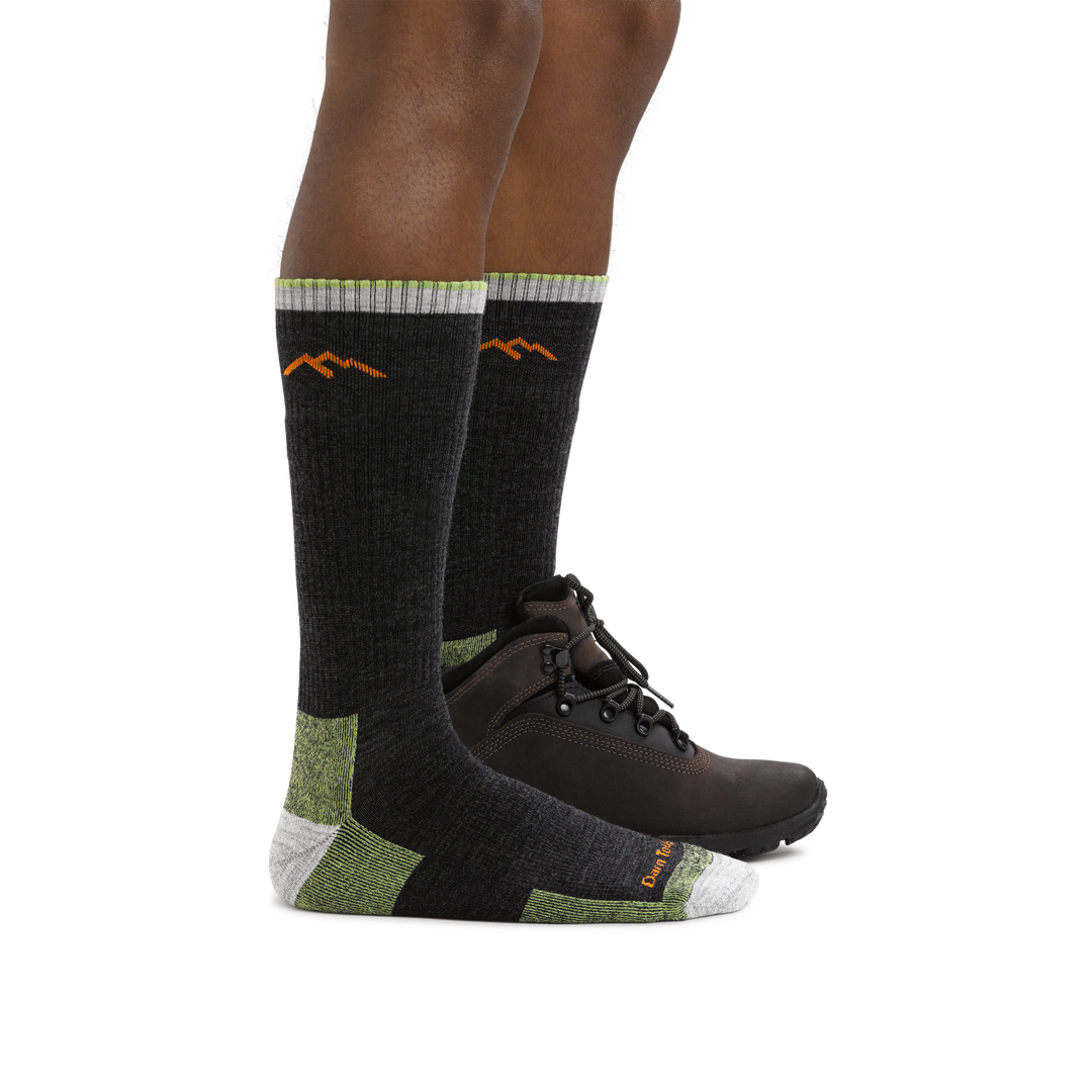 Man  wearing Hiker Boot Midweight Hiking Socks with Cushion in Lime, back foot wearing a hiking boot
