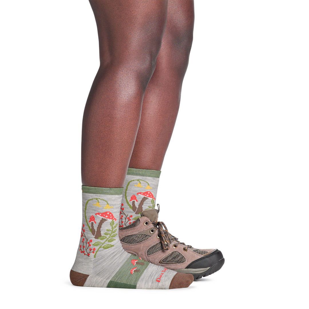 on model image with back foot in hiking shoe wearing the mellow mushroom micro crew hiking sock in ash colorway